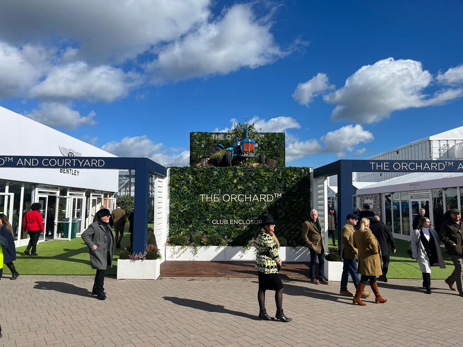 faux Selfie wall with tractor feature placed on top at cheltenham festival for the orchard entrance