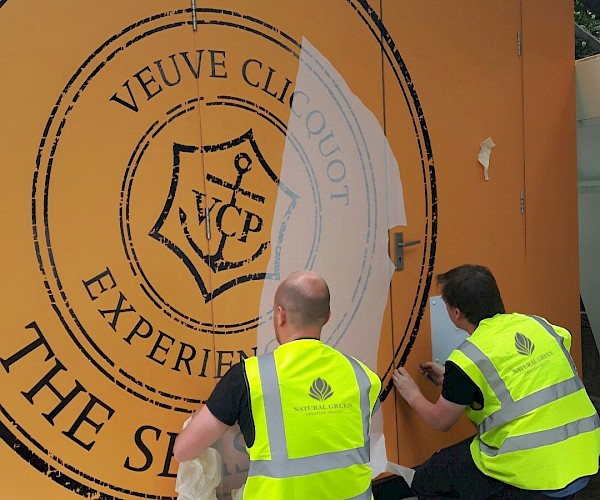 branding being applied via a vinyl sticker