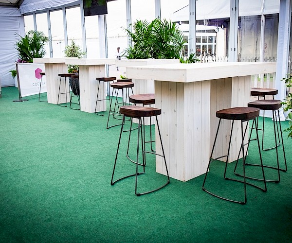 high wooden tables and chairs