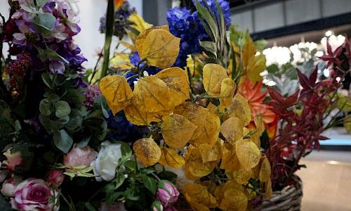 January Furniture Show close up of artificial florals